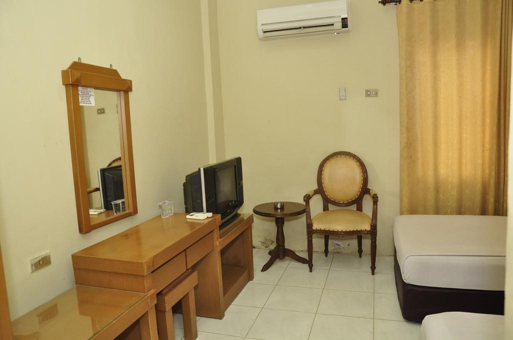 Hotel Andhika Syariah Samarinda Δωμάτιο φωτογραφία